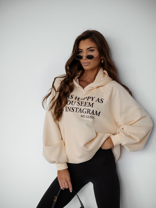 Baltas džemperis su kapišonu